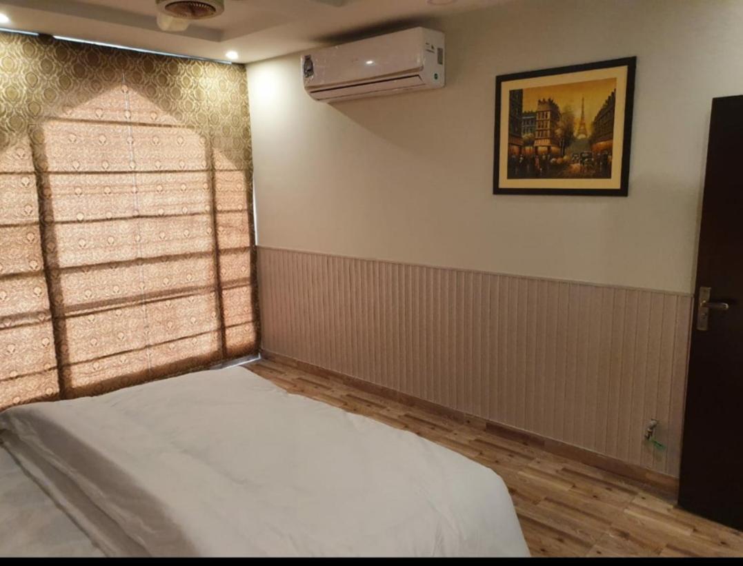 Hak Mall Suites And Apartments 拉瓦尔品第 外观 照片